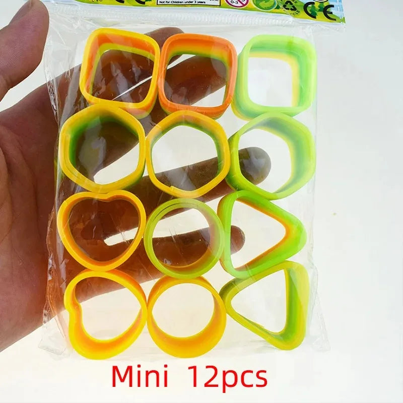 12/24PCS Rainbow Magic Springs Circle Toys Kids Birthday Party Favors Guests Giveaway Small Gifts Pinata Fillers Flexible Funny Toy