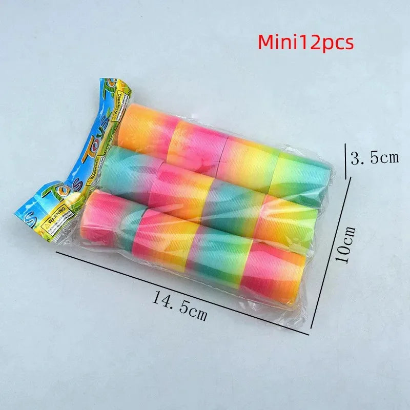12/24PCS Rainbow Magic Springs Circle Toys Kids Birthday Party Favors Guests Giveaway Small Gifts Pinata Fillers Flexible Funny Toy